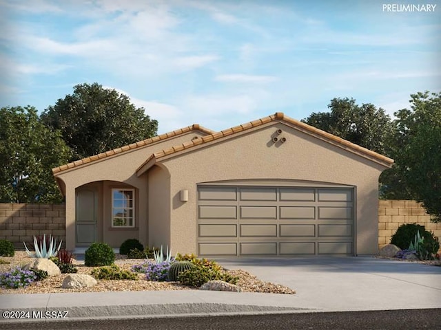 view of front of property with a garage