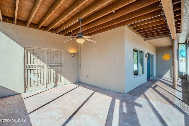 view of patio / terrace featuring ceiling fan