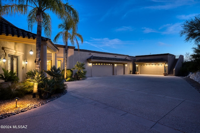 view of front of home with a garage