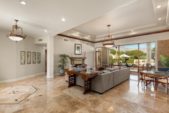 living room with a raised ceiling