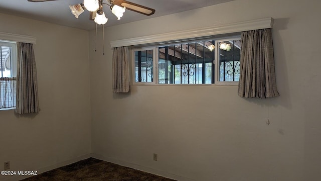 unfurnished room featuring ceiling fan