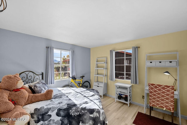 bedroom featuring light hardwood / wood-style floors