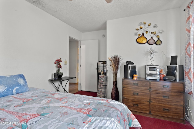 bedroom featuring a textured ceiling