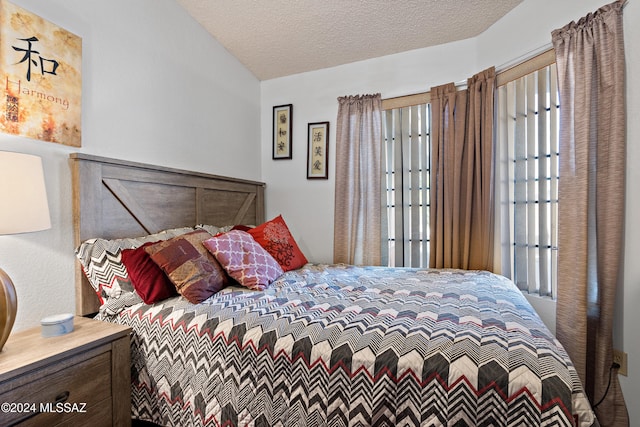 bedroom featuring a textured ceiling