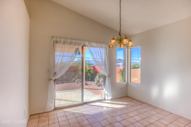 unfurnished dining area with light tile patterned floors, vaulted ceiling, and a notable chandelier