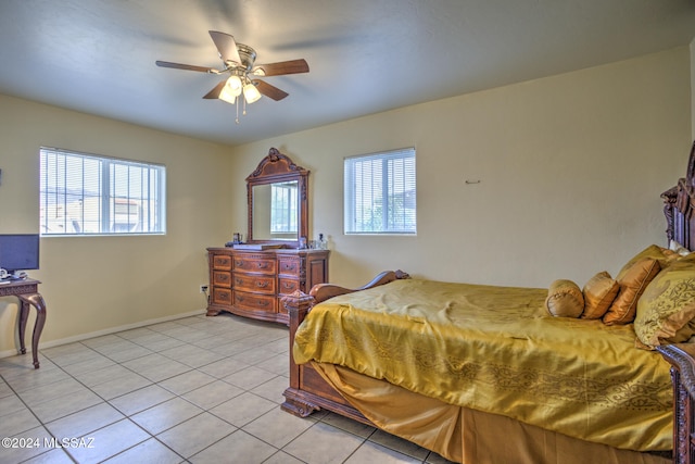 bedroom featuring ceiling fan and light tile patterned floors