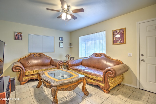 living room featuring ceiling fan and light tile patterned floors