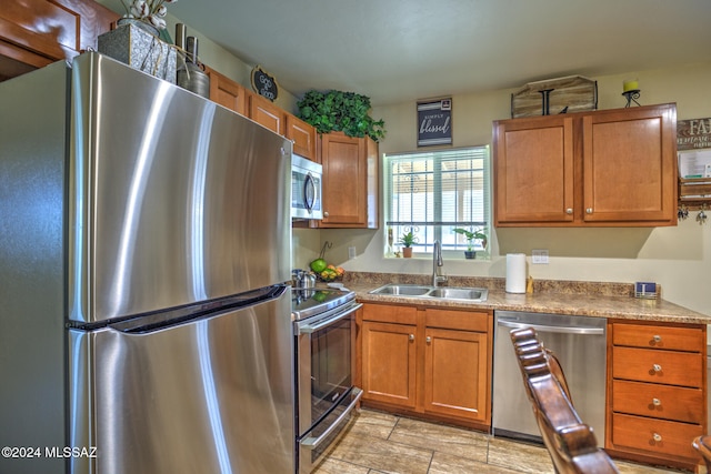 kitchen featuring sink and appliances with stainless steel finishes