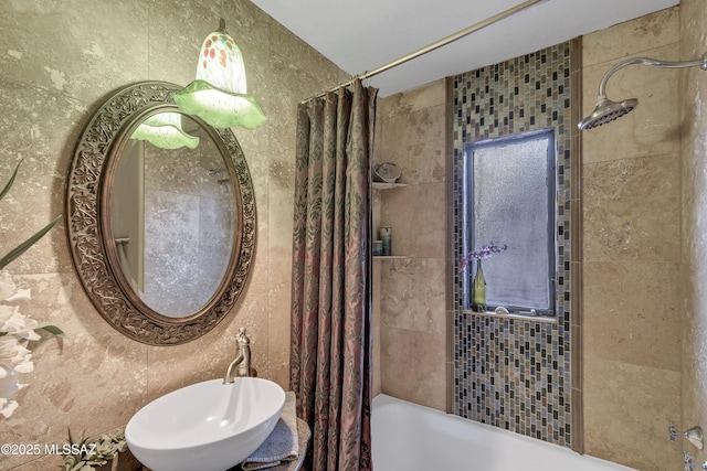 bathroom featuring sink and shower / tub combo