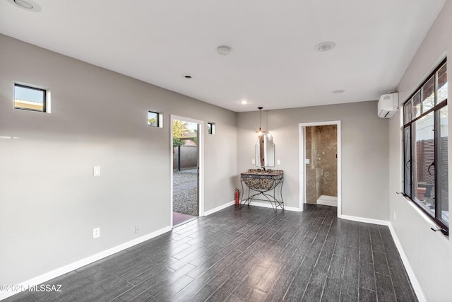 spare room with a wall unit AC