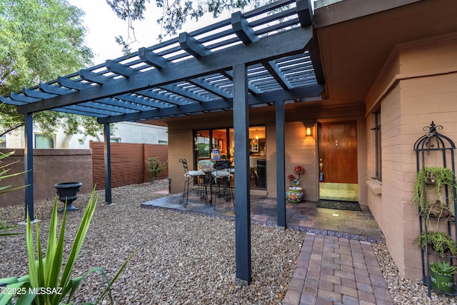 view of patio featuring a pergola