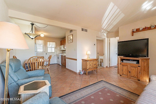 living room featuring light tile patterned floors