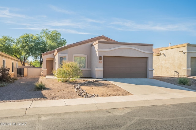 view of front of property featuring a garage