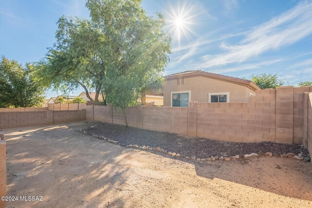 back of property featuring a patio