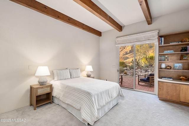 bedroom with light carpet, access to exterior, and beam ceiling