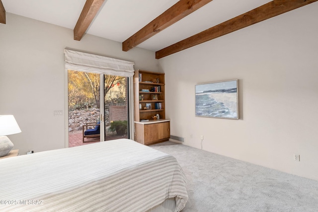 carpeted bedroom featuring access to outside and beamed ceiling