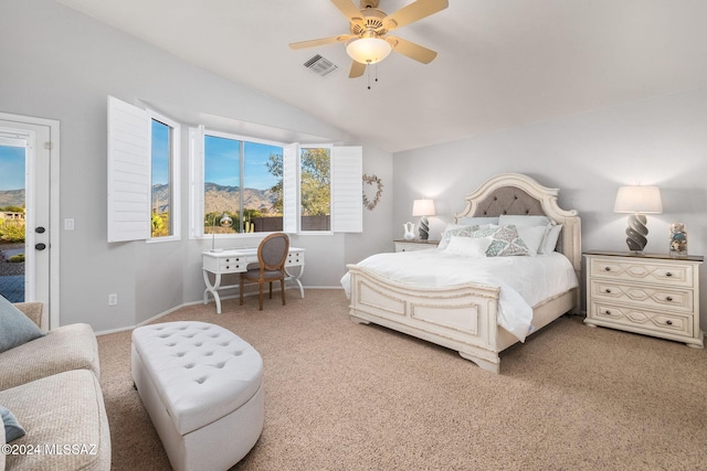 carpeted bedroom featuring vaulted ceiling, ceiling fan, and access to exterior