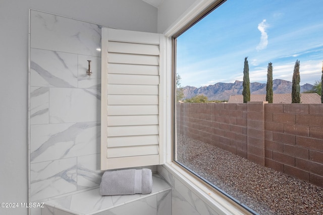 bathroom with a mountain view