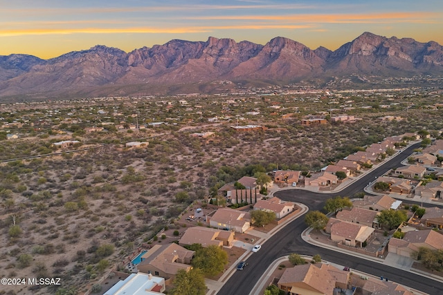 aerial view at dusk with a mountain view