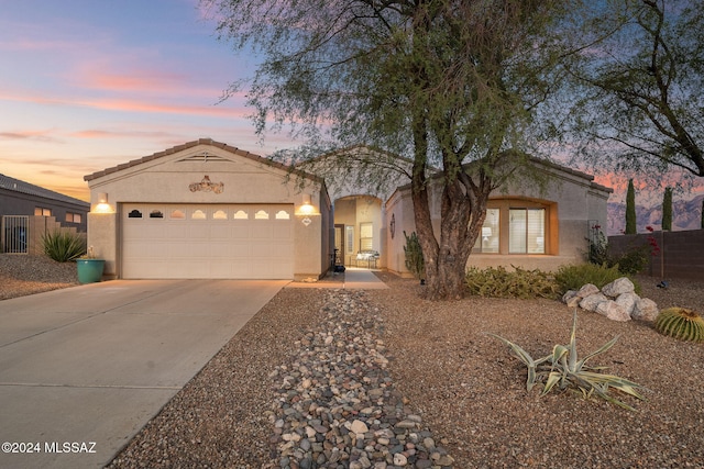 view of front of home with a garage