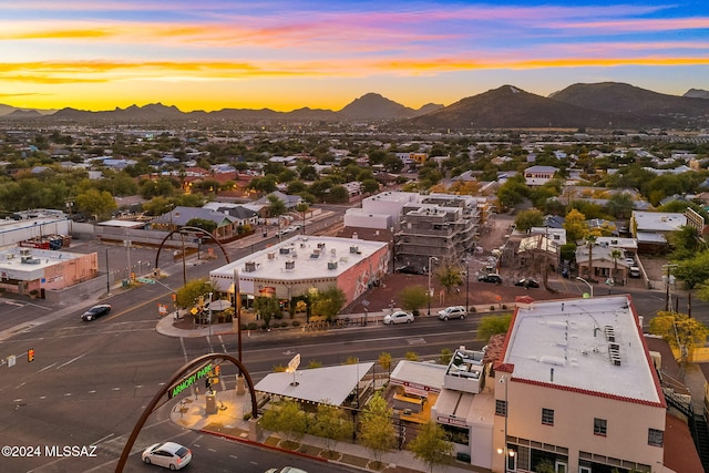 aerial view at dusk with a mountain view