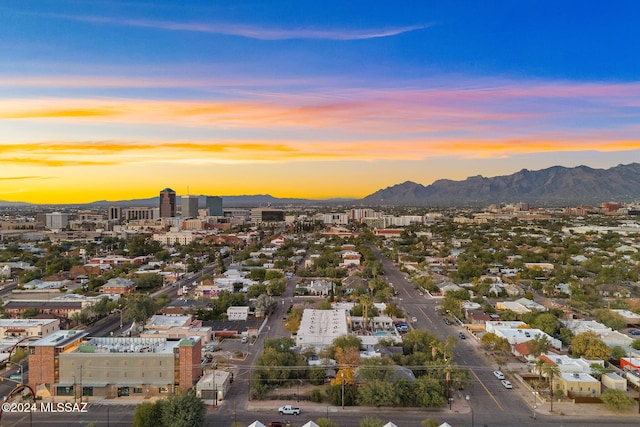 aerial view at dusk with a mountain view