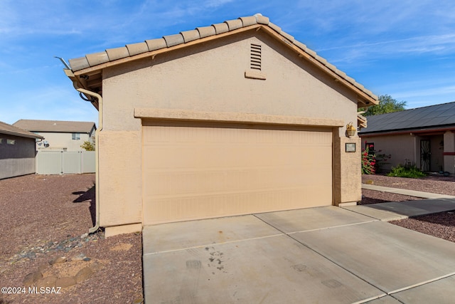 exterior space with a garage