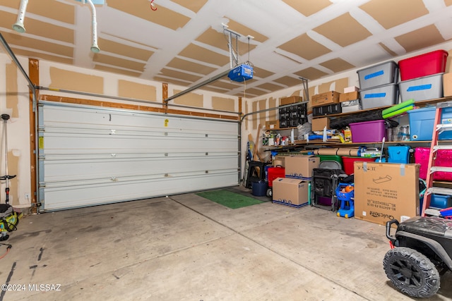 garage featuring a garage door opener