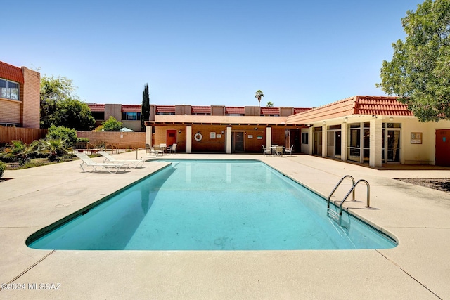 view of pool featuring a patio area