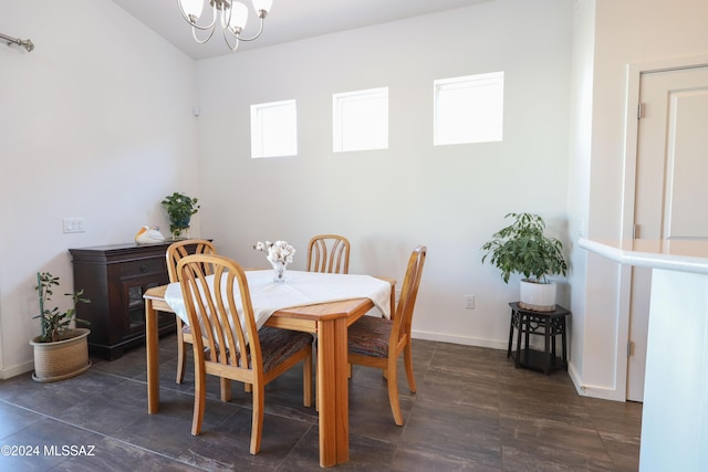 dining space featuring an inviting chandelier