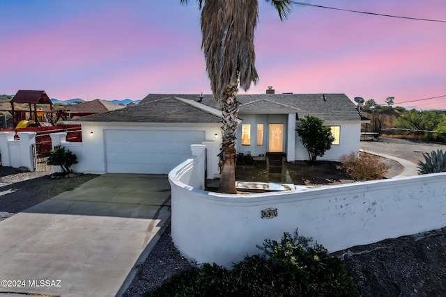 view of front of home featuring a garage