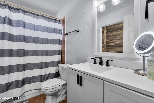 bathroom with walk in shower, vanity, toilet, and tile patterned flooring