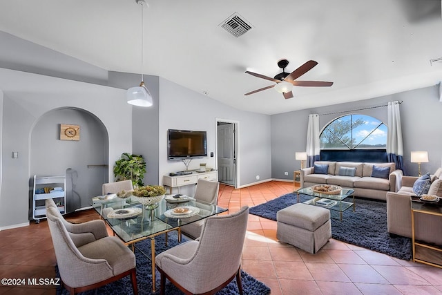 tiled living room with vaulted ceiling and ceiling fan