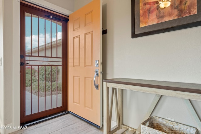 entryway featuring light wood-style floors