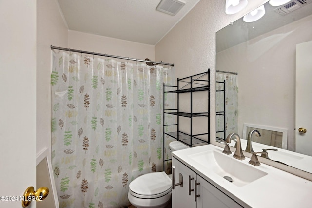 full bathroom featuring vanity, shower / bath combination with curtain, and toilet