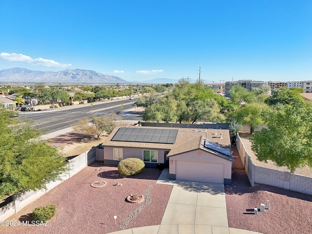 drone / aerial view featuring a mountain view