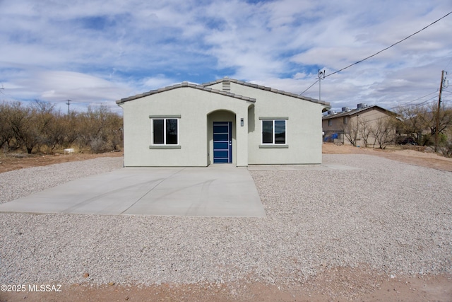 view of front of house featuring a patio area