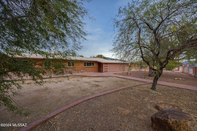 1440 W Roller Coaster Rd, Tucson, AZ 85704 - view of front of house with brick siding
