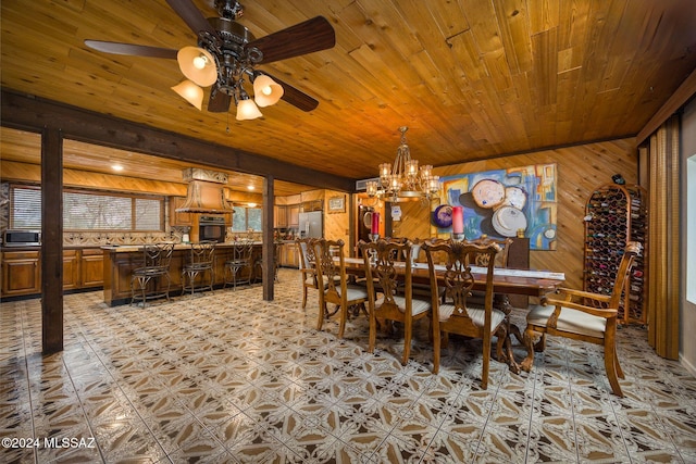 1440 W Roller Coaster Rd, Tucson, AZ 85704 - dining area featuring wooden walls, a ceiling fan, wooden ceiling, and a chandelier