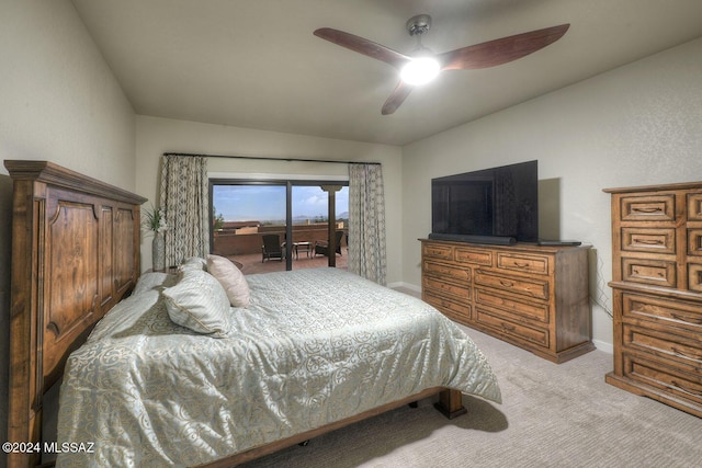 carpeted bedroom with access to exterior, a ceiling fan, and baseboards