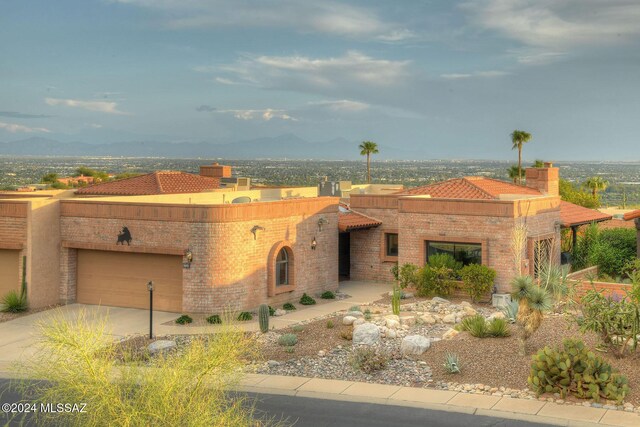 view of patio terrace at dusk