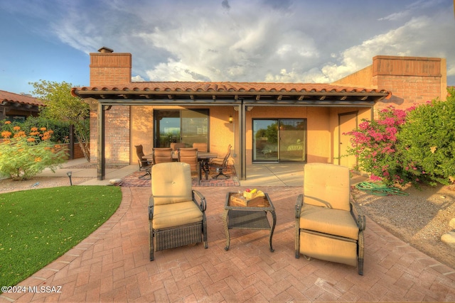 view of patio featuring outdoor dining area