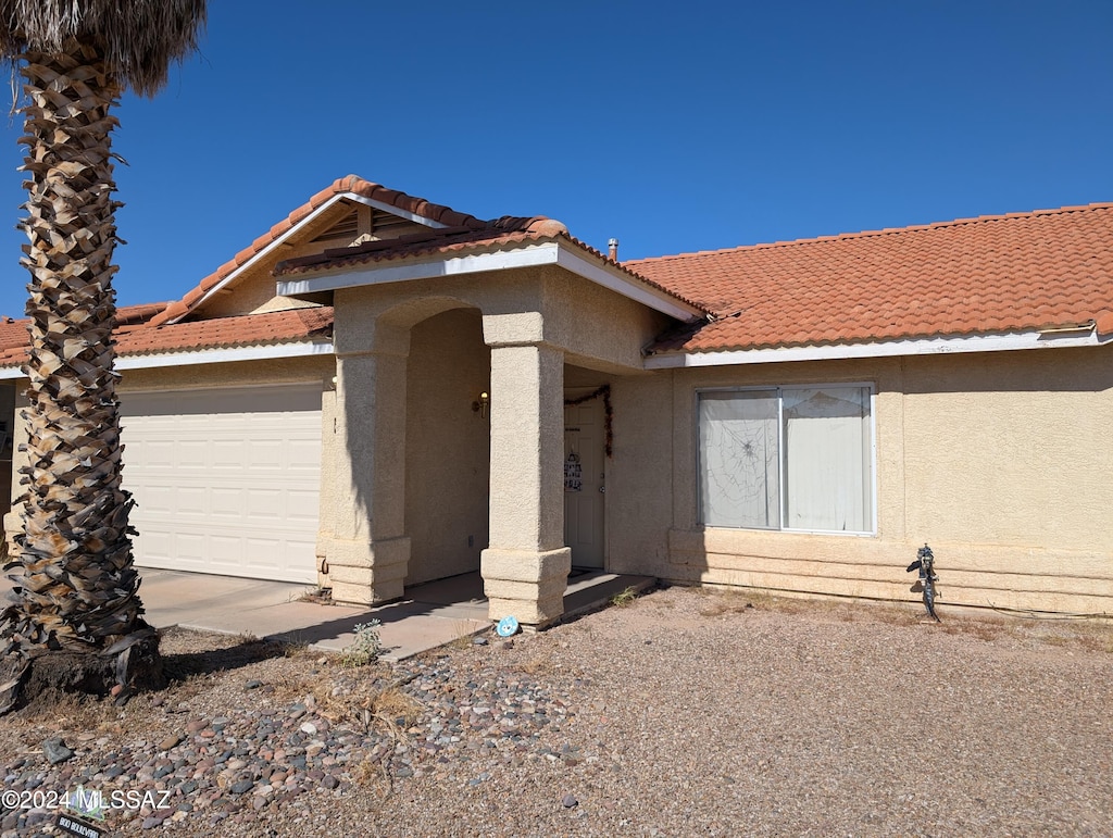 ranch-style house with a garage