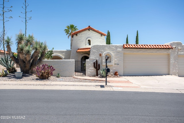 view of front of home with a garage