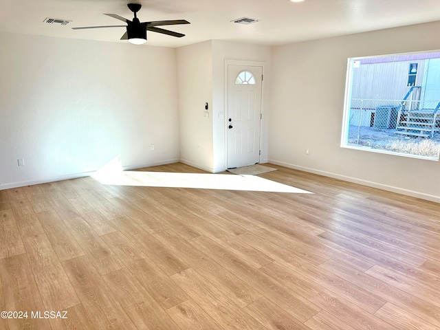 entrance foyer with light hardwood / wood-style flooring and ceiling fan