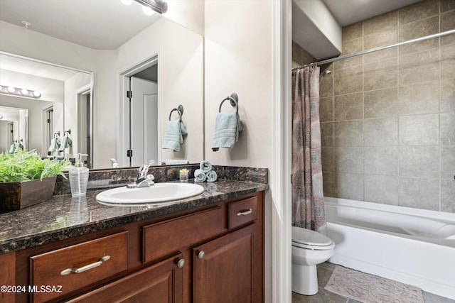 full bathroom featuring vanity, toilet, and shower / tub combo