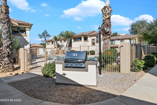 view of patio / terrace featuring grilling area and exterior kitchen