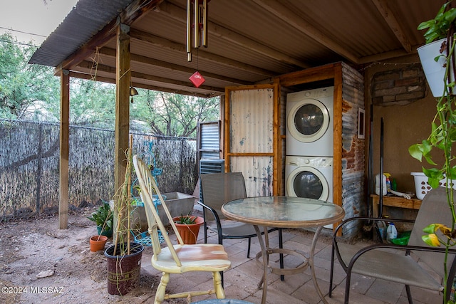 view of patio / terrace featuring stacked washer / dryer