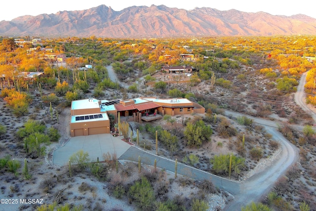 drone / aerial view featuring a mountain view