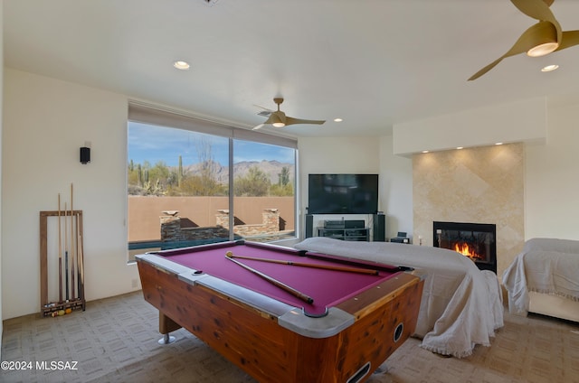 recreation room featuring a ceiling fan, a high end fireplace, billiards, and recessed lighting